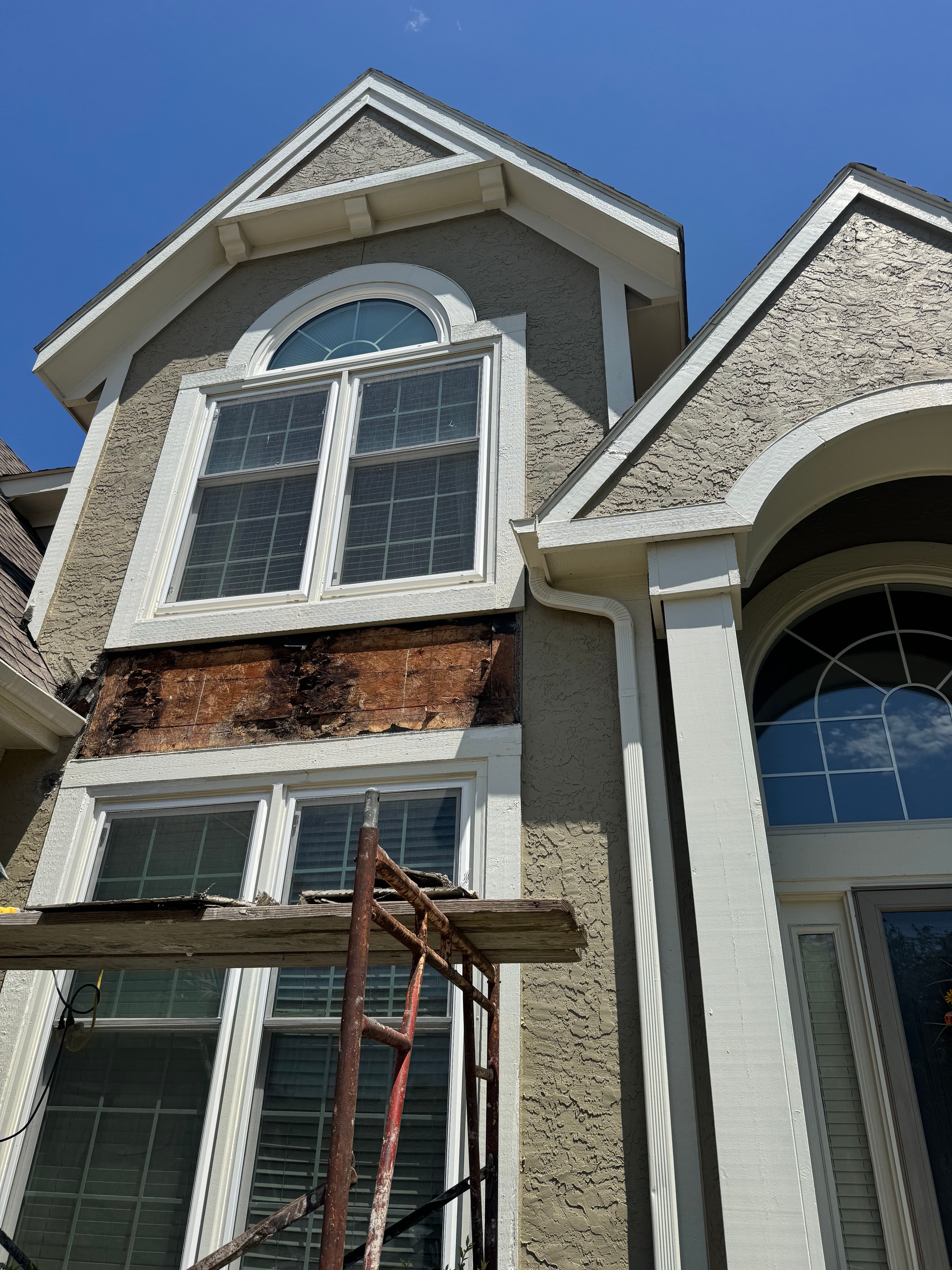 Project Wood Rot and Stucco Repair on a Two-Story Home Exterior image