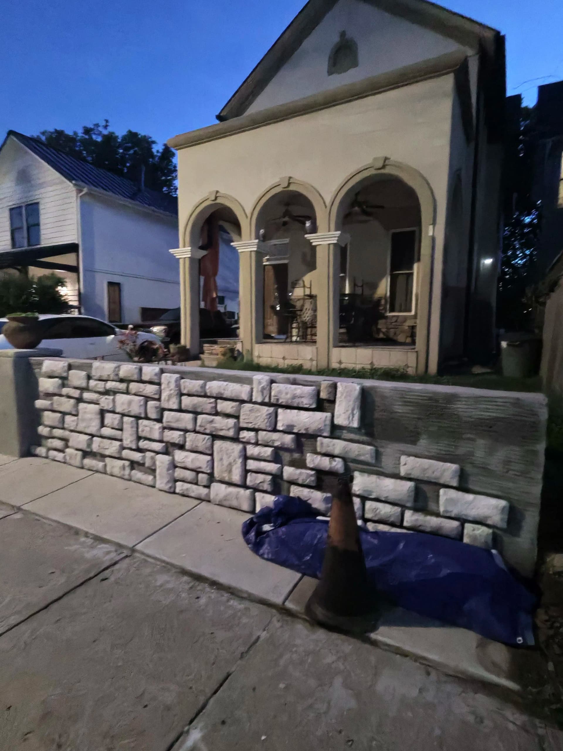 Stone Retaining Wall That Makes a Home's Front Look Complete image