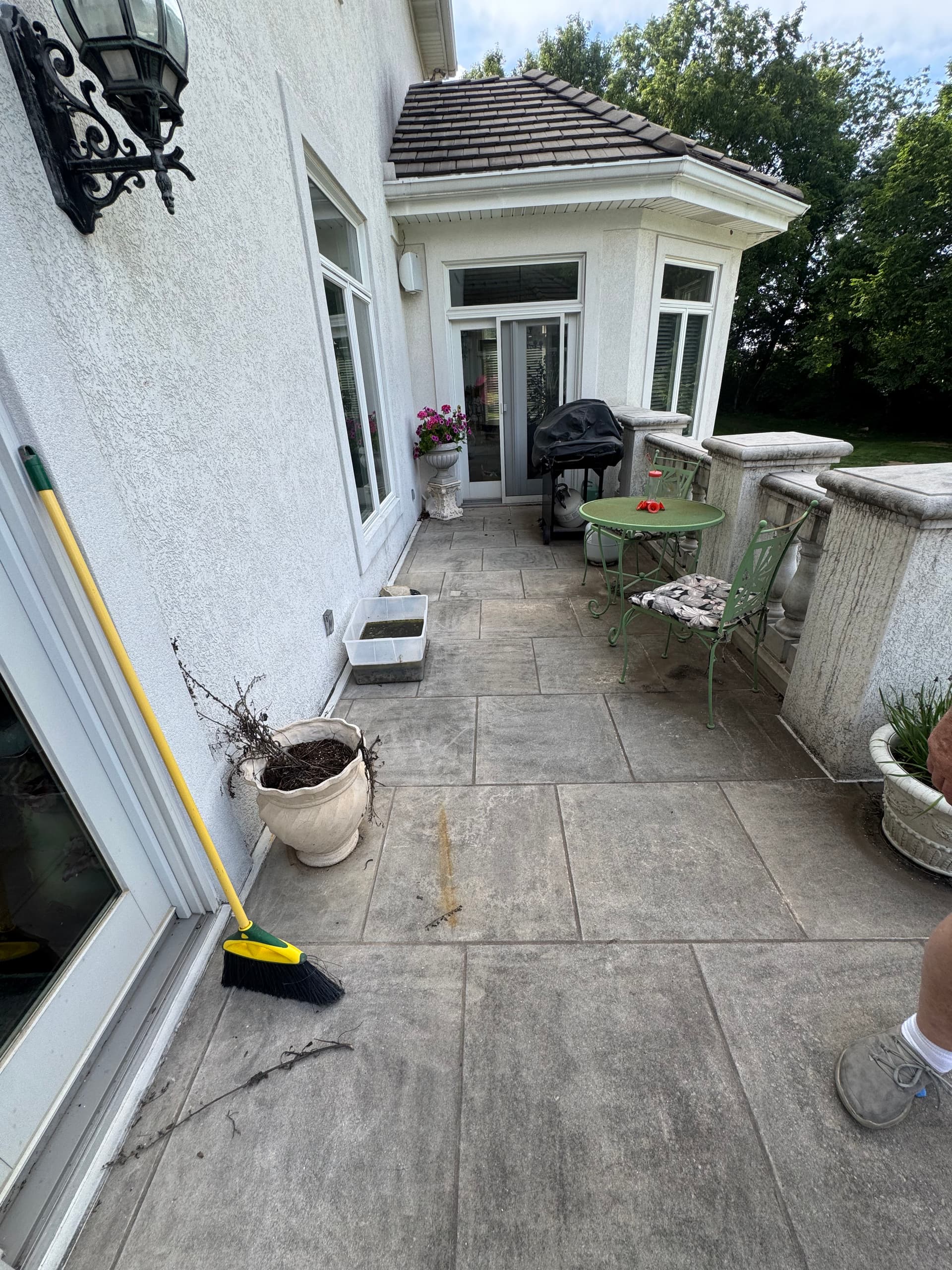 Power Washing a Patio and Pool Area Back to Clean image