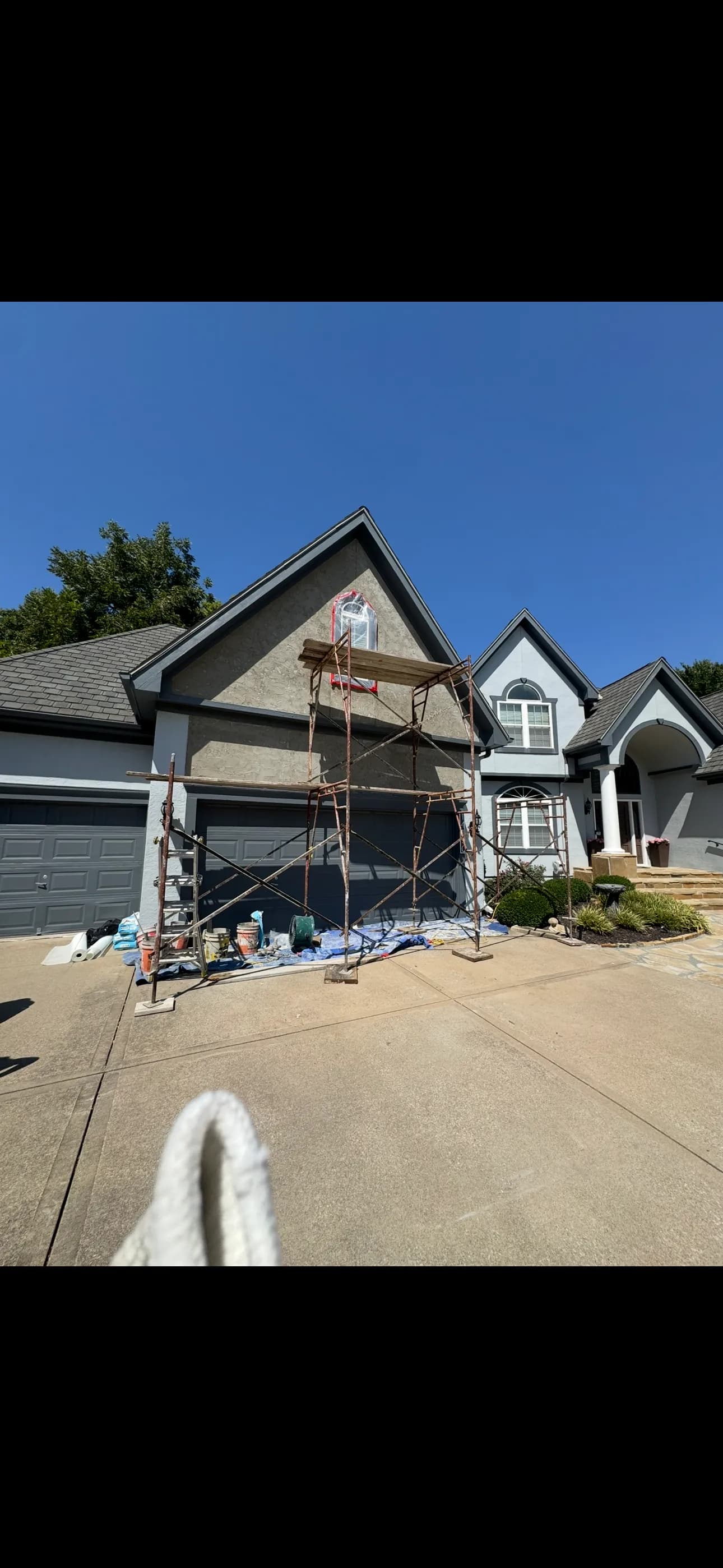 Gallery photos for Cracked Stucco Exterior Gets a Full Skim Coat and Paint Refresh: Image #1